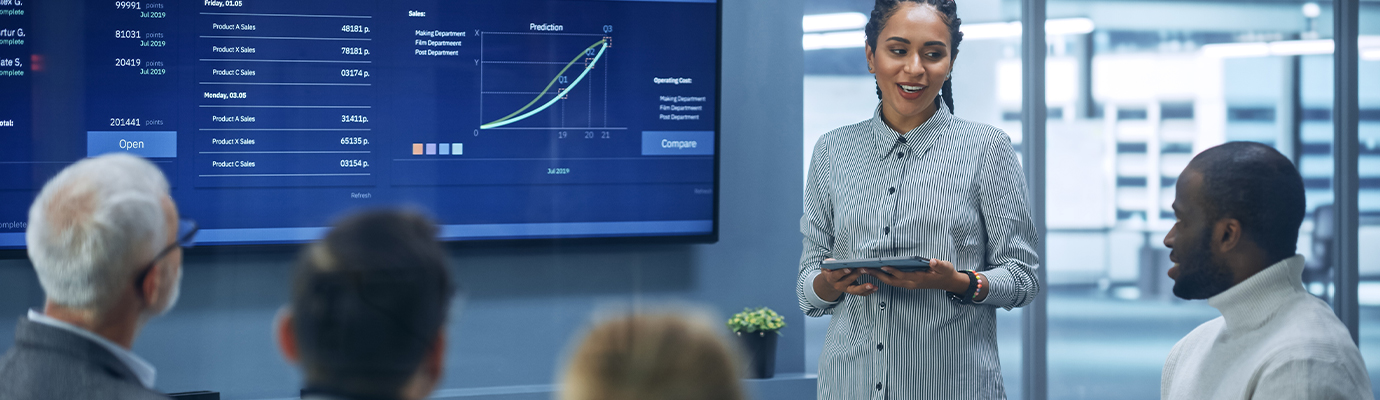 a woman giving a presentation