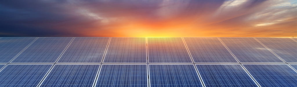 solar panels at sunrise