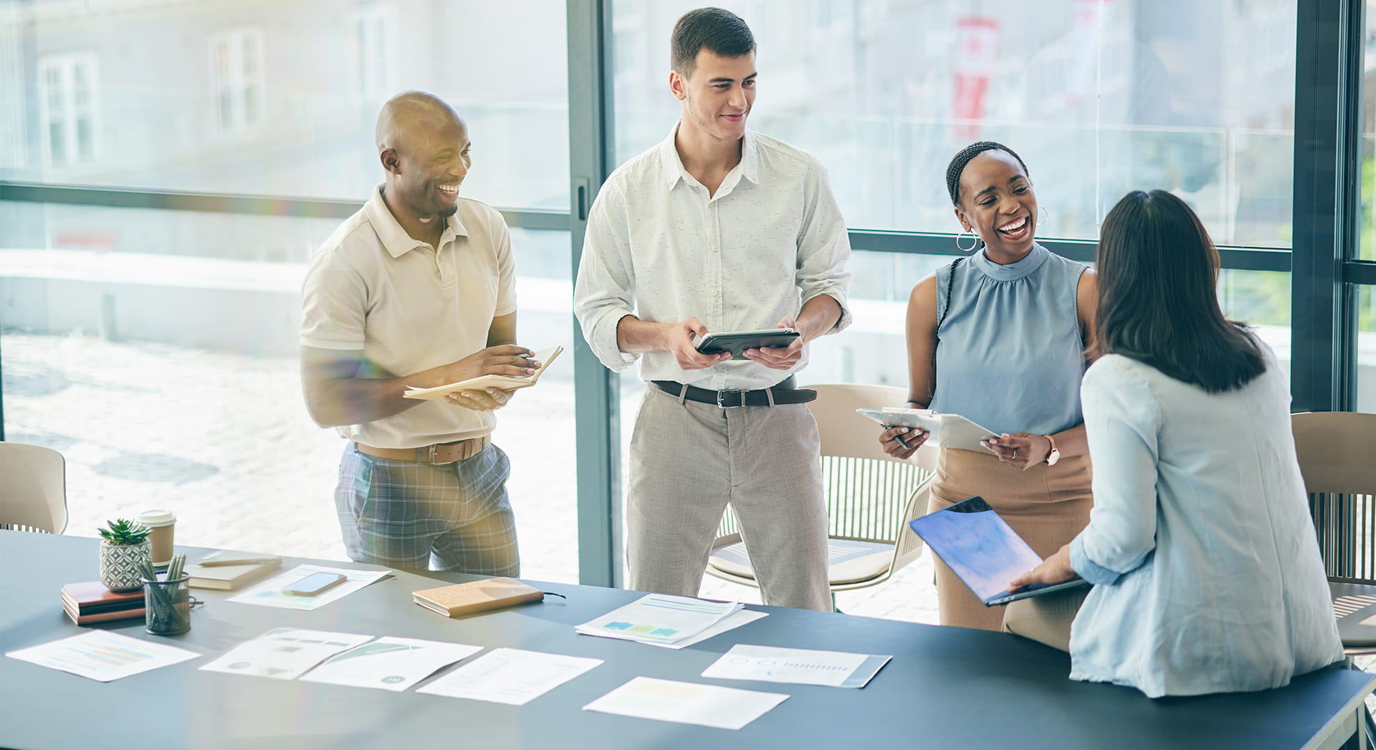 coworkers talking around a table