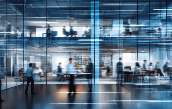 people walking quickly in an office