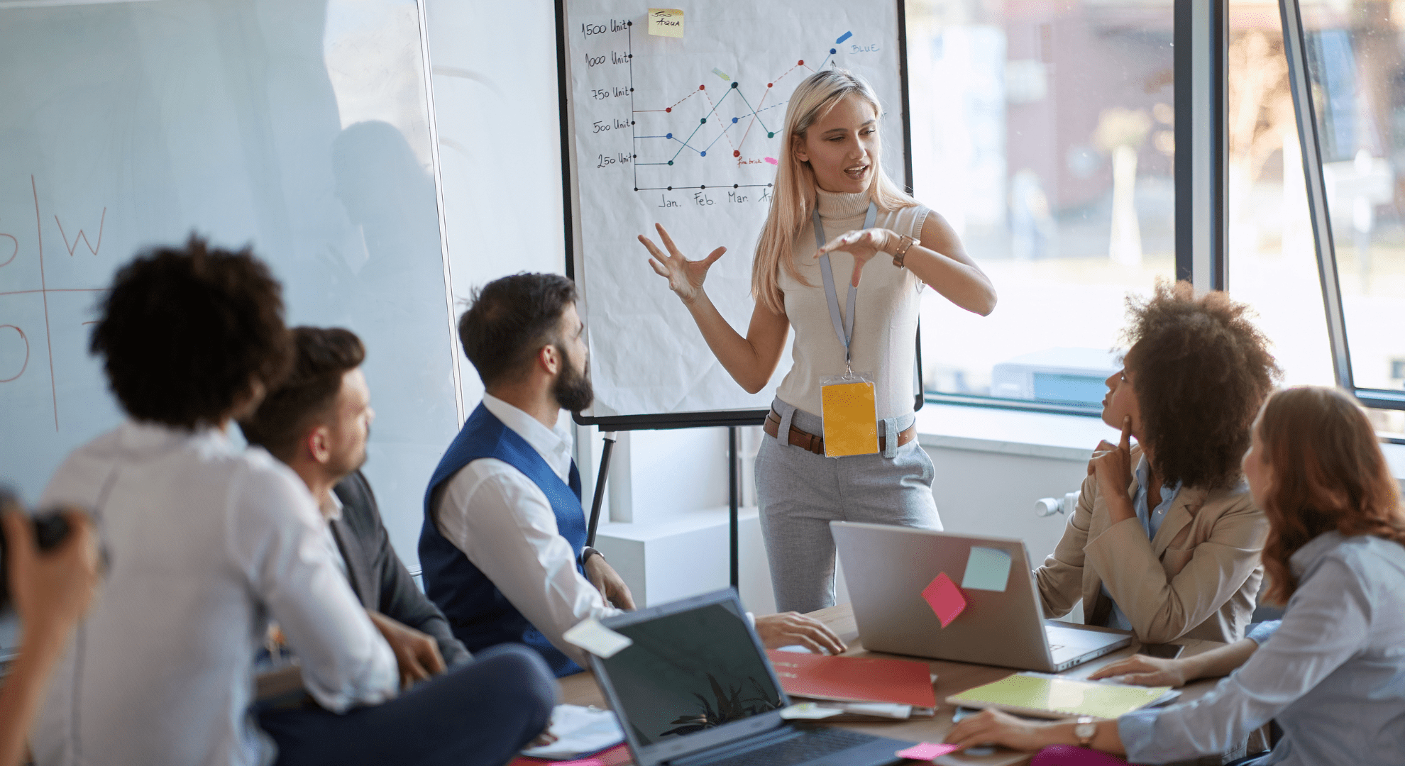 a team going over a presentation at a table