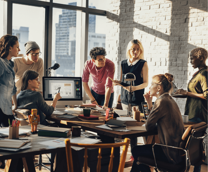 interns collaborating around a table